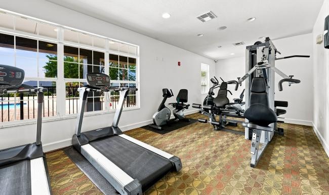 a gym with treadmills